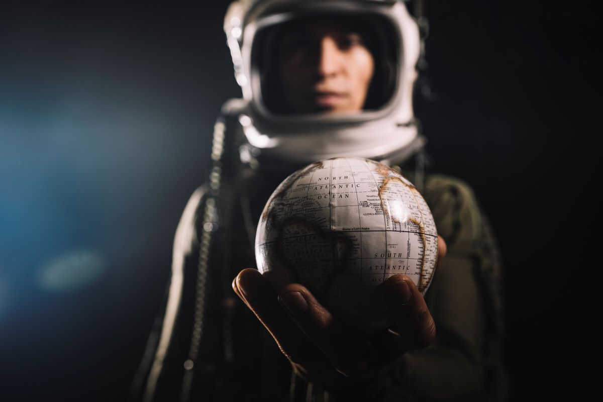 a men astronaut standing in a space
