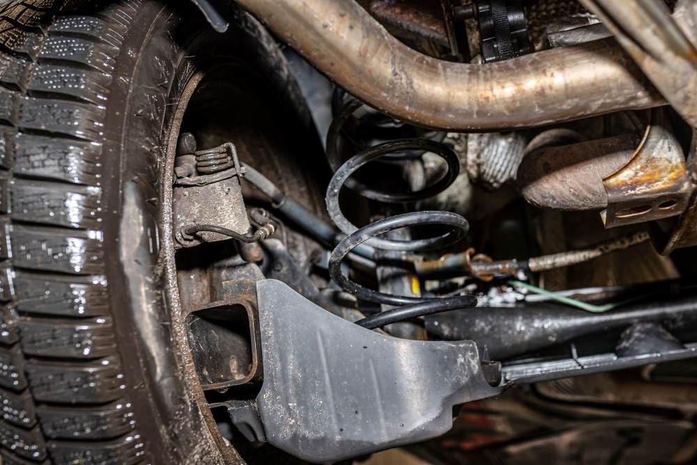 bottom view of independent suspension system in car