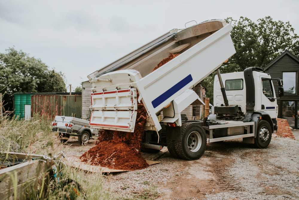 dump truck unloading soil