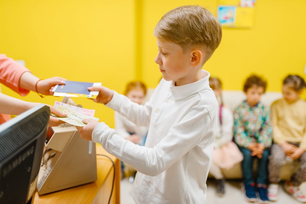 boy buying tickets