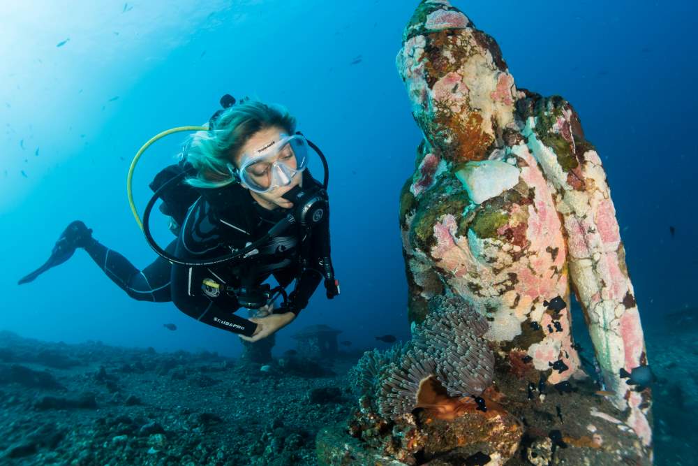 get the blissful scuba diving experience in pemuteran bay with your partners