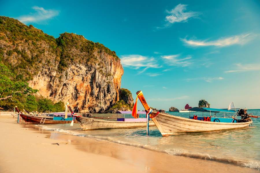 three boats on the beach