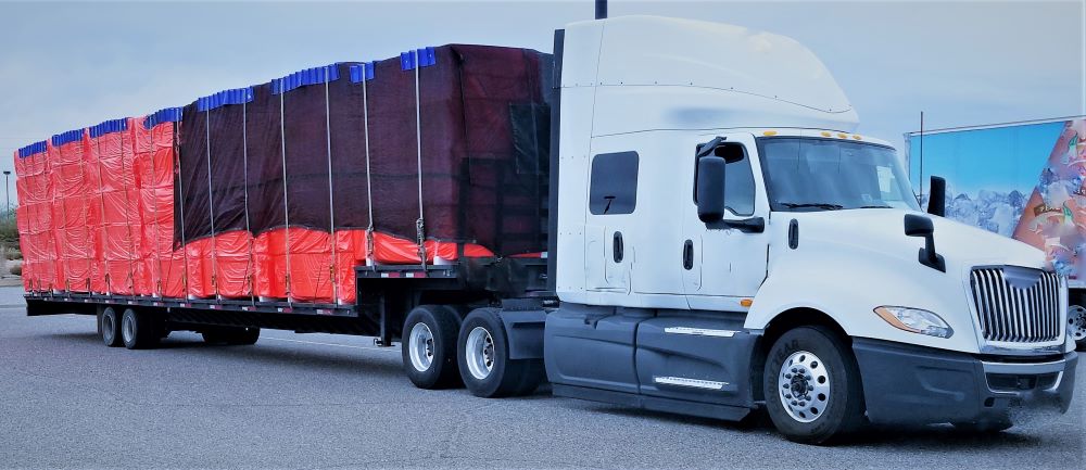 white truck with loads