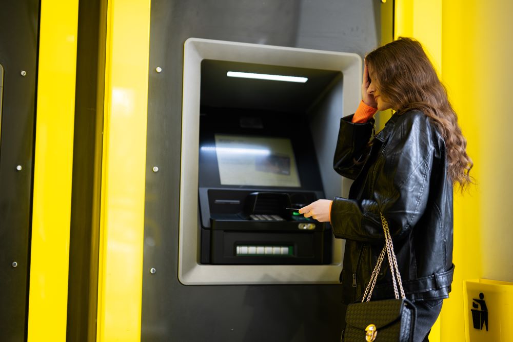 girl at atm
