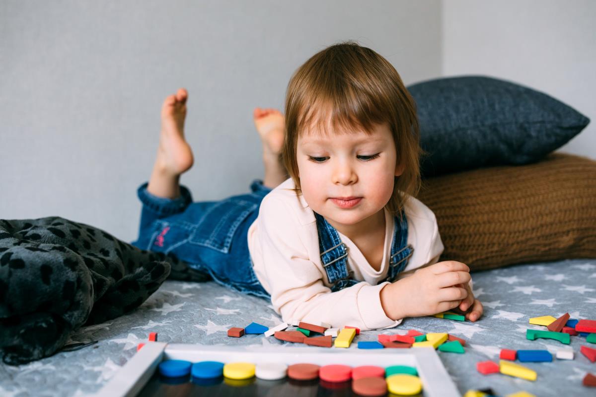 toddler playing educational game